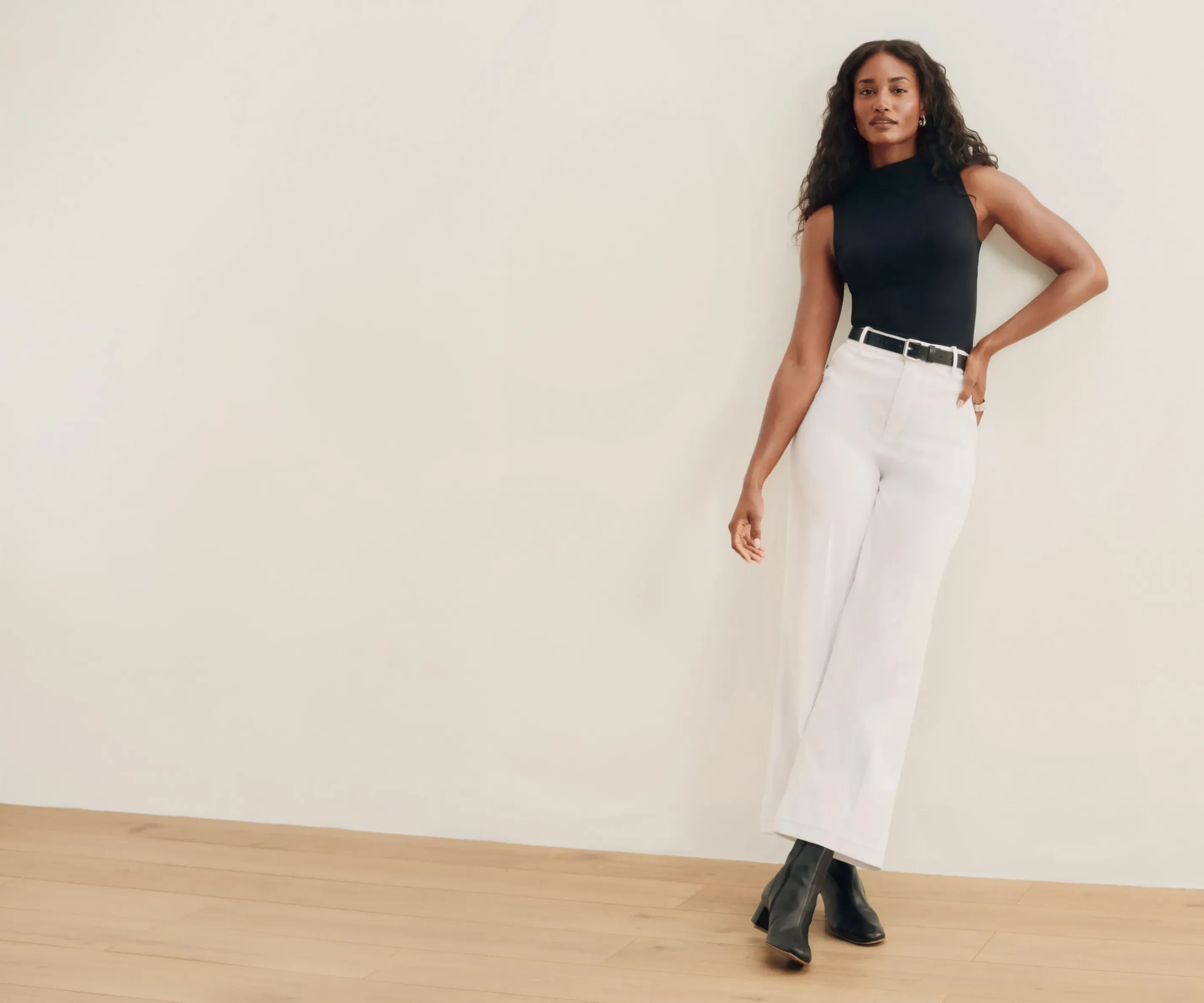 Woman wearing SPANX Stretch Twill trousers